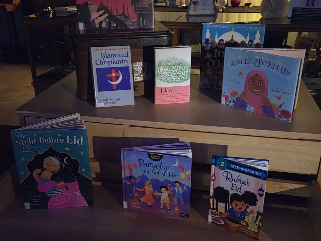 Books about Islam, Ramadan and Eid stand on display, including The Night Before Eid and Under My Hijab.